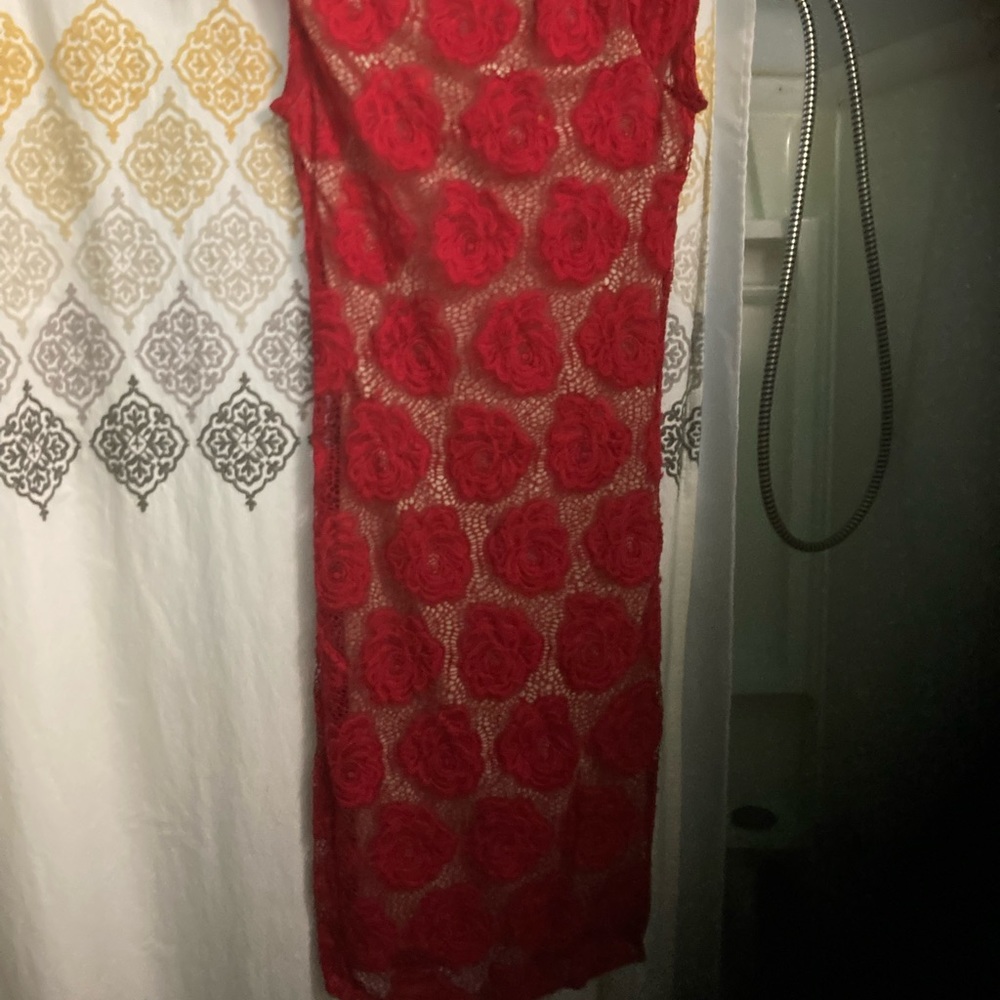 Joe and Elle.  Very pretty.  Vintage. Sleeveless.